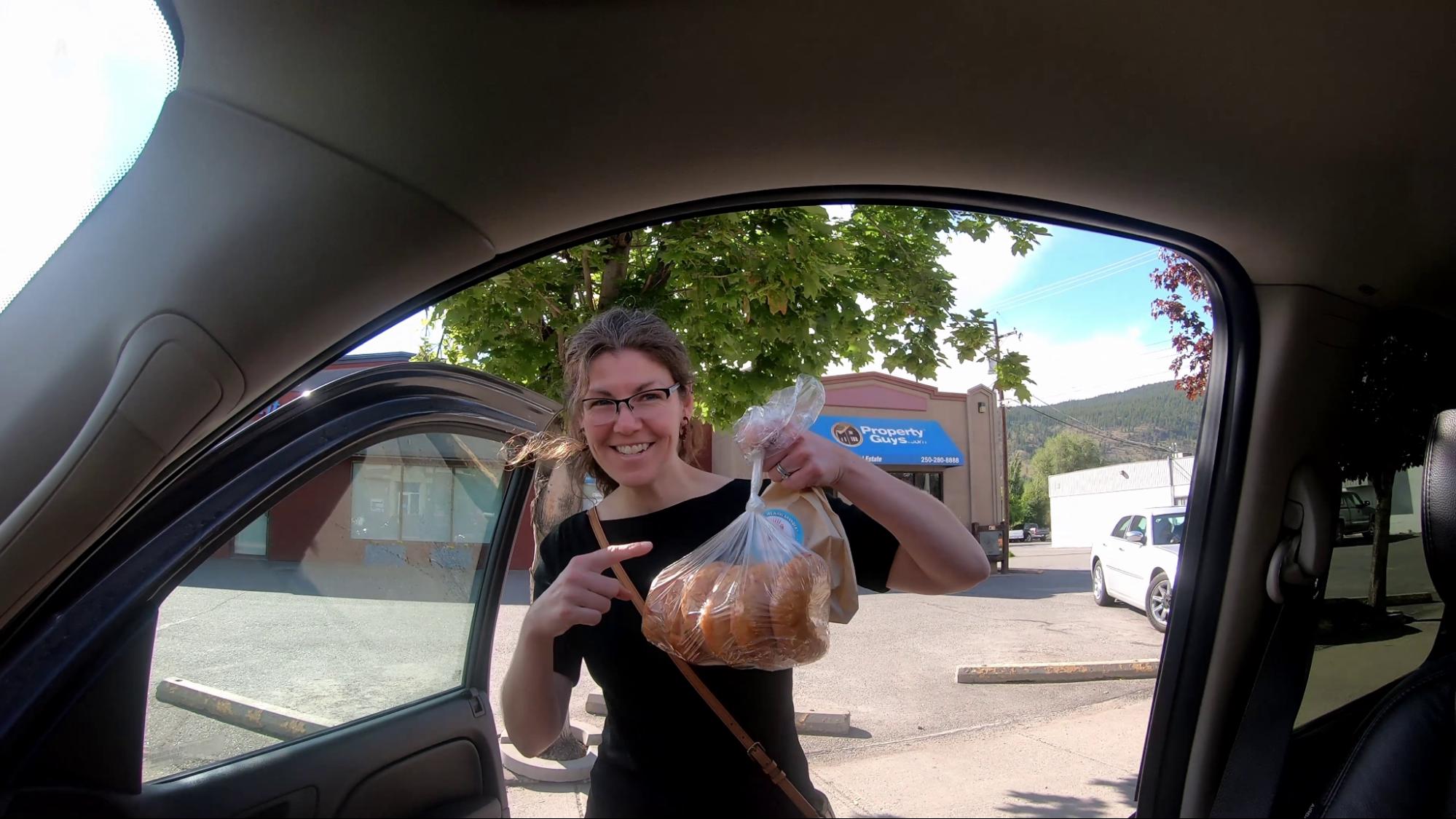 Getting bannock Mel shows the bannock she bought at Kekuli Cafe in Merritt, BC. Our favorite stop there.